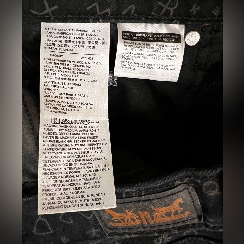 Levi's Legging Fit Skinny Mid Rise Jeans Black Grey Symbols Woman's size 31x30 - Picture 9 of 10
